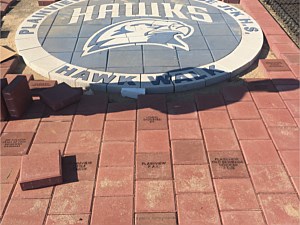 plainview hawks fundraising patio custom paverart blue logo paver installation walkway track field